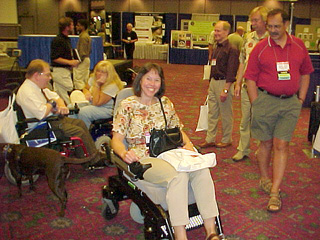 Linda Petty testing a motorized wheelchair