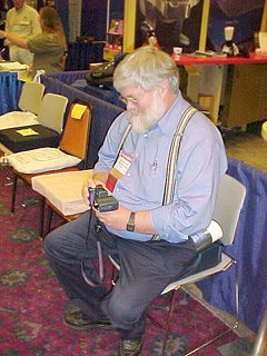 Denis Anson prepares his digital camera