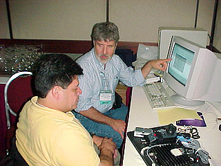 Barry Romich explains the fine points to Ramon Castillo