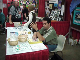 Kevin Caves promoting RESNA '99 with raffles and tatoos