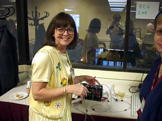 Carrie Brown and reflection of a digital photographer