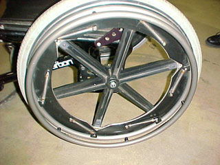 W. Mark Richter "Design of a Low-Impact Wheelchair Pushrim" - Proceedings page 305
