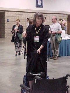 Alexandra Enders in standing electric wheelchair