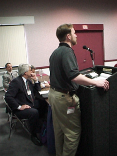 photo of Tom Whelan and panel